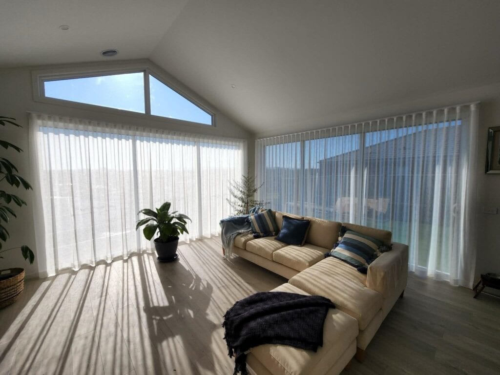 Sheer Curtains In Light Filled Room